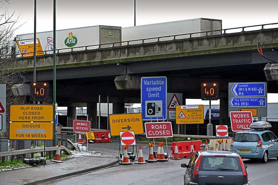 roadworks and variable speed limit sign